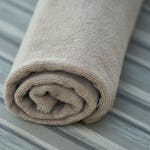 Rolled Gray Towel in Closeup Photo